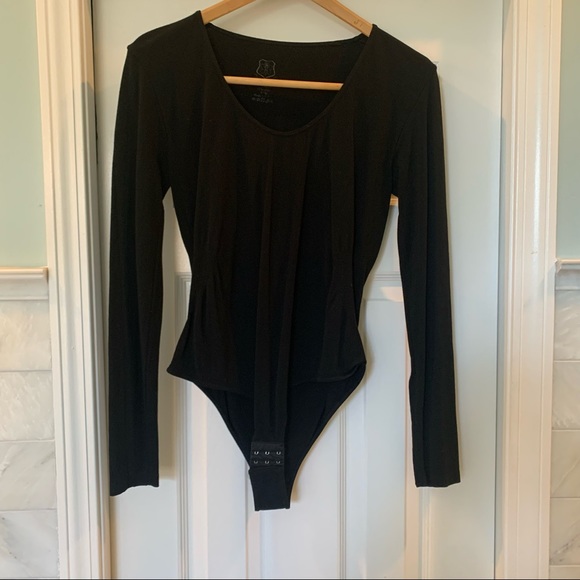 Royal Park Tops - Black long sleeve body suit. Scoop neckline. Adjusts to 3 different lengths.